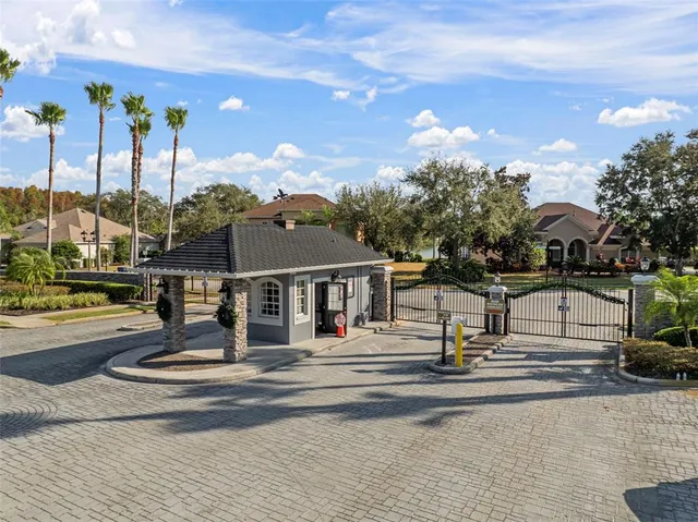 an aerial view of residential houses and outdoor space