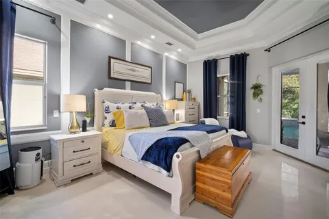 a bed room with a bed and a couch