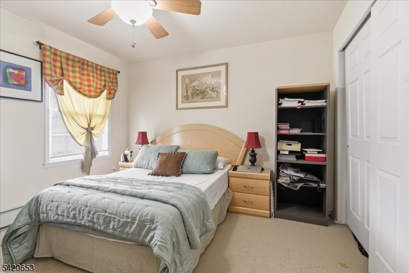 26 Eldora Road Parsippany, NJ 07054 - Photo 26 of 47 a bedroom with a bed and a window