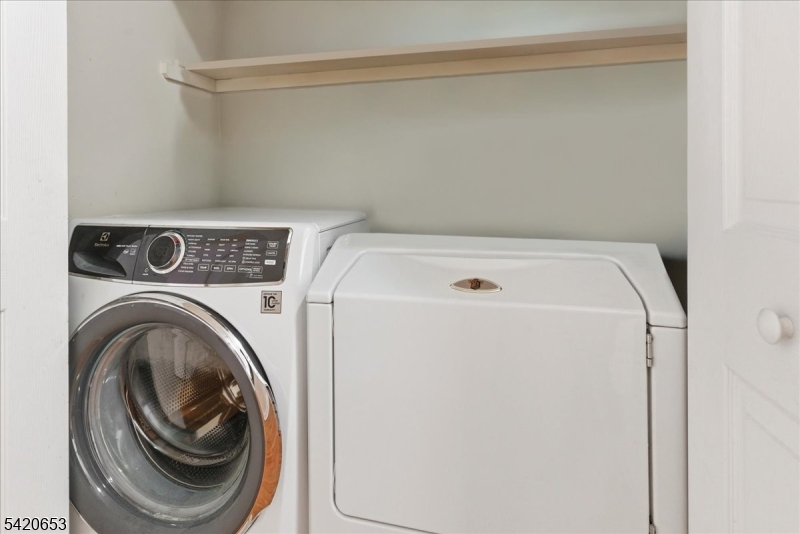 26 Eldora Road Parsippany, NJ 07054 - Photo 32 of 47 a utility room with dryer and washer