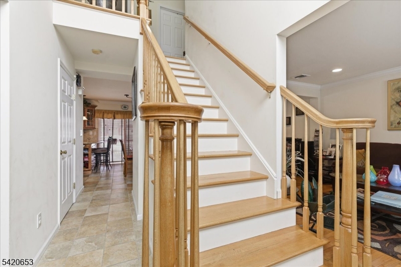 26 Eldora Road Parsippany, NJ 07054 - Photo 4 of 47 a view of entryway and hall with wooden floor