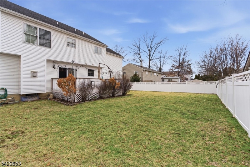 26 Eldora Road Parsippany, NJ 07054 - Photo 41 of 47 a backyard of a house with table and chairs