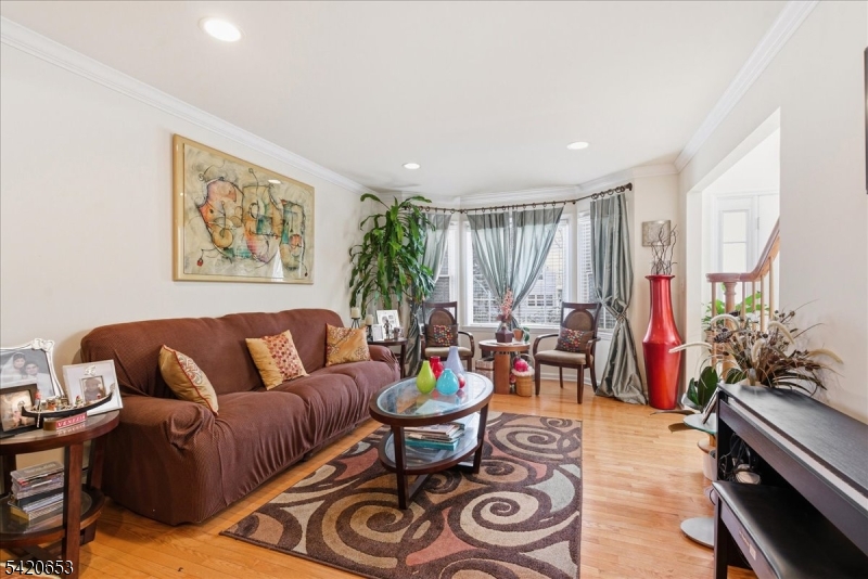 26 Eldora Road Parsippany, NJ 07054 - Photo 9 of 47 a living room with furniture and a large window