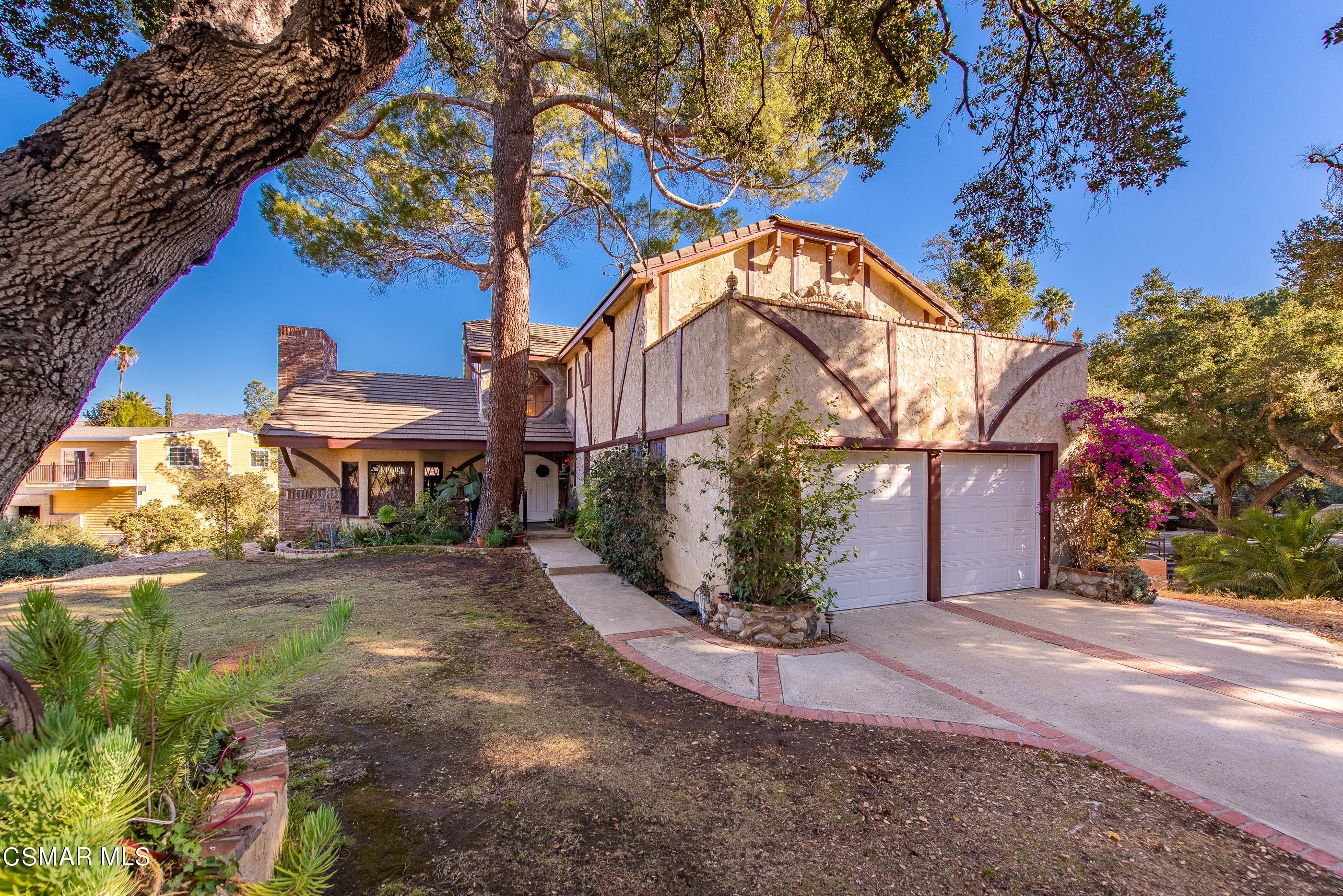 1074 Katherine Road Simi Valley, CA 93063 - Photo 3 of 80 a view of a house with a yard
