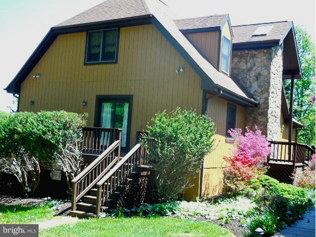5130 Fox Tower Road Smithsburg, MD 21783 - Photo 2 of 30 a front view of a house with a yard