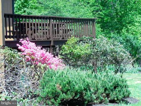 5130 Fox Tower Road Smithsburg, MD 21783 - Photo 3 of 30 a view of a garden with wooden fence