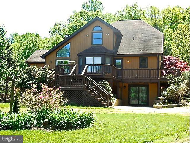 5130 Fox Tower Road Smithsburg, MD 21783 - Photo 5 of 30 a front view of a house with garden
