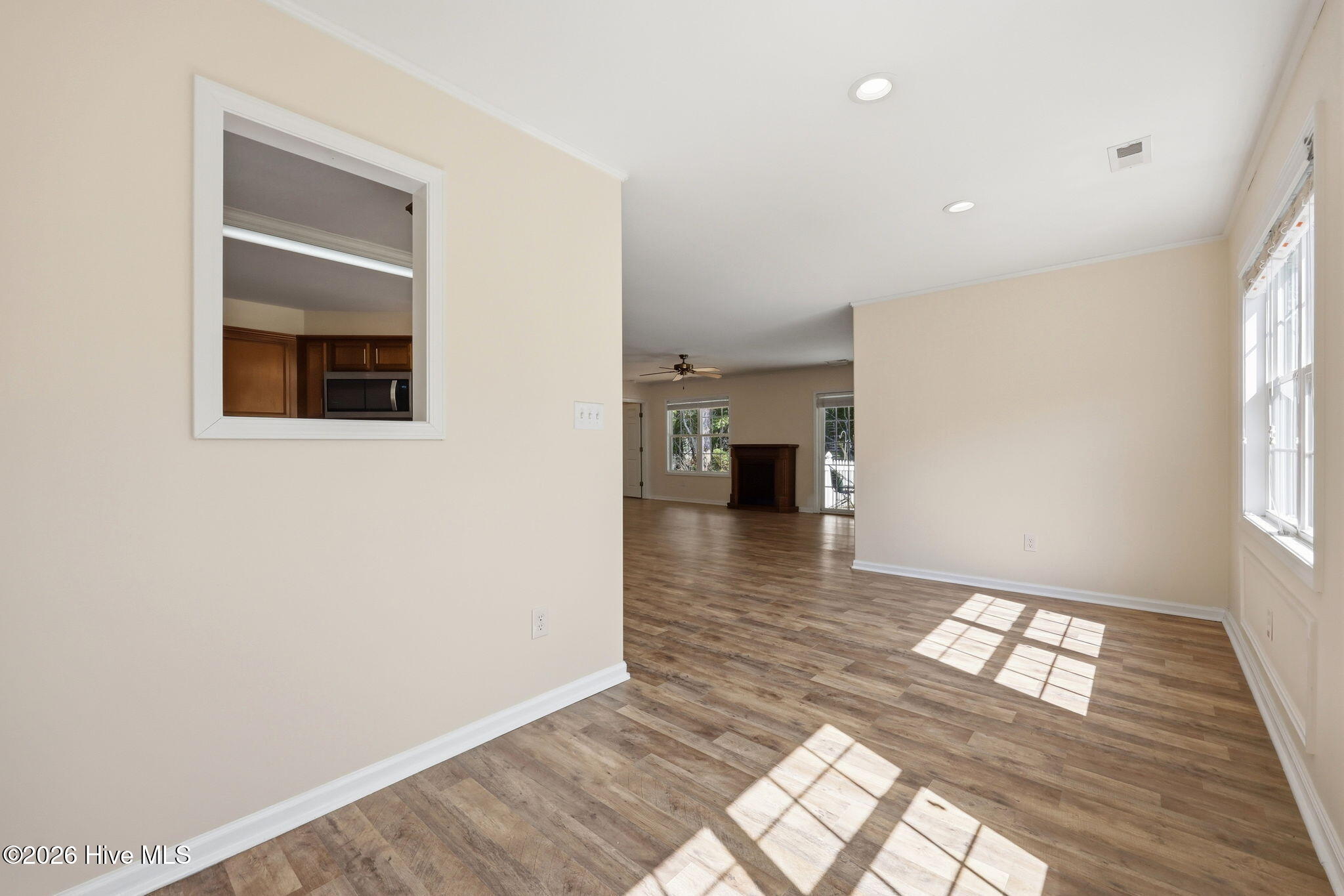 702 Hummingbird South Swansboro, NC 28584 - Photo 14 of 34 Dining area looking into living room