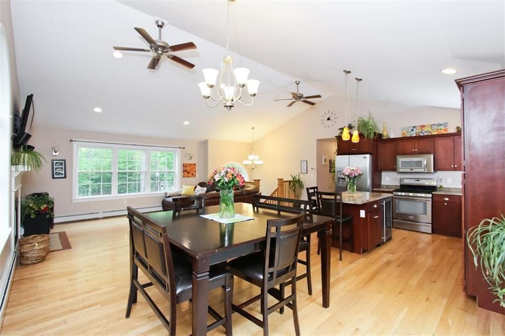 94 Sand Bar Road Windham, ME 04062 - Photo 5 of 24 View of kitchen and family room with...