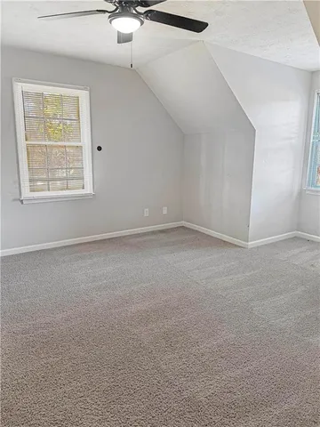 en empty room with windows