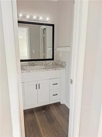 a view of cabinets with wooden floor