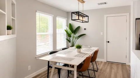 a bedroom with a bed and a table