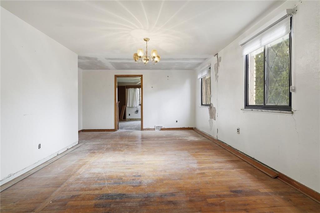 138 Enger Avenue Pittsburgh, PA 15214 - Photo 16 of 50 a view of an empty room with a window