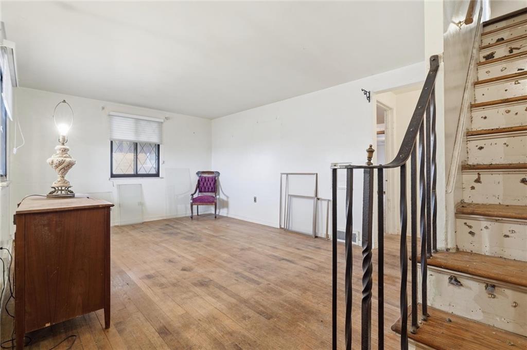 138 Enger Avenue Pittsburgh, PA 15214 - Photo 2 of 50 a view of a livingroom with wooden floor and stairs