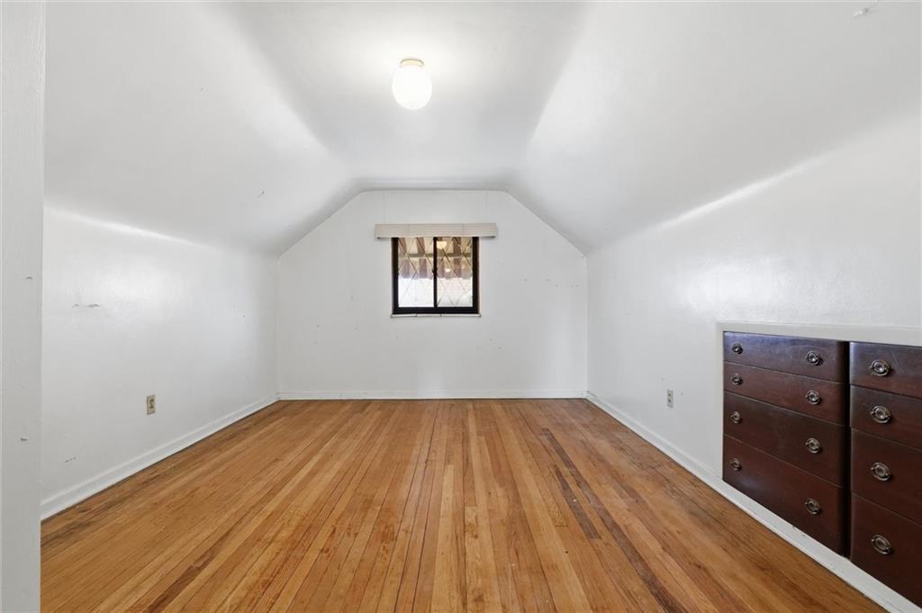 138 Enger Avenue Pittsburgh, PA 15214 - Photo 23 of 50 wooden floor in an empty room with a window