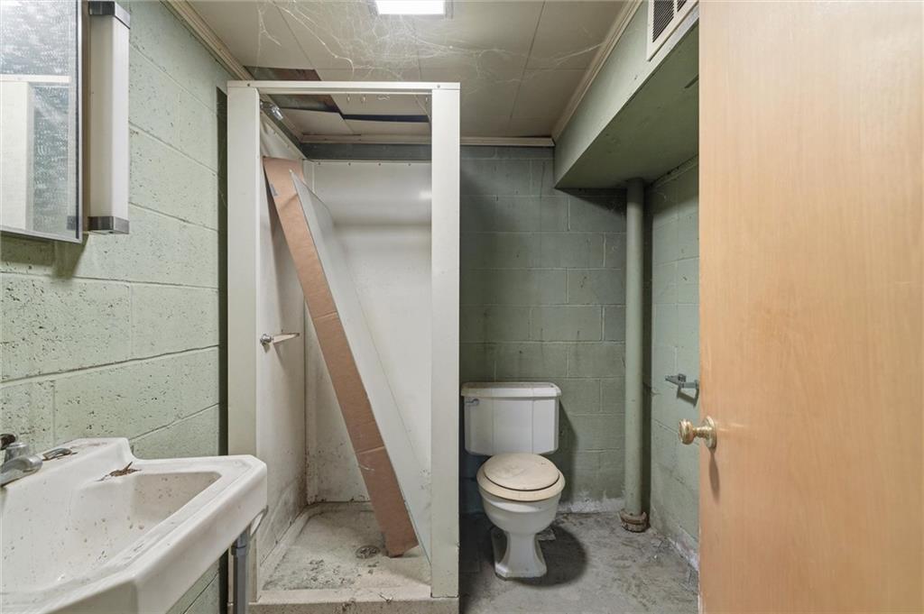 138 Enger Avenue Pittsburgh, PA 15214 - Photo 33 of 50 a bathroom with a toilet and a sink