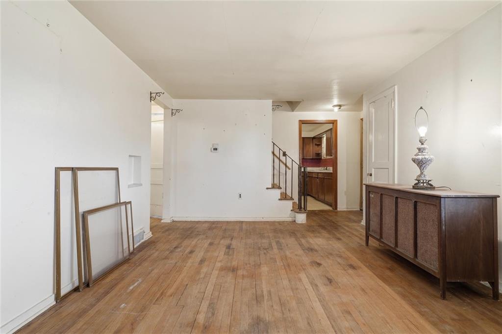 138 Enger Avenue Pittsburgh, PA 15214 - Photo 4 of 50 a view of a room with wooden floor and a sink