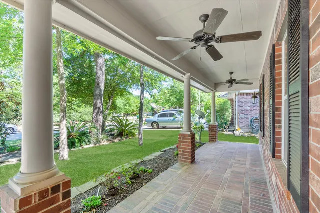 a view of a porch and garden