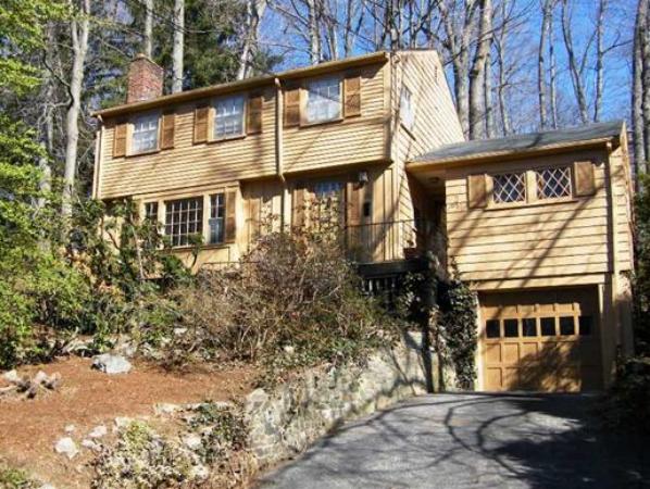 68 Rokeby Road Newton, MA 02468 - Photo 1 of 1 a front view of a house with a yard and garage