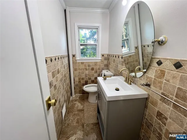 a view of an empty room and stairs