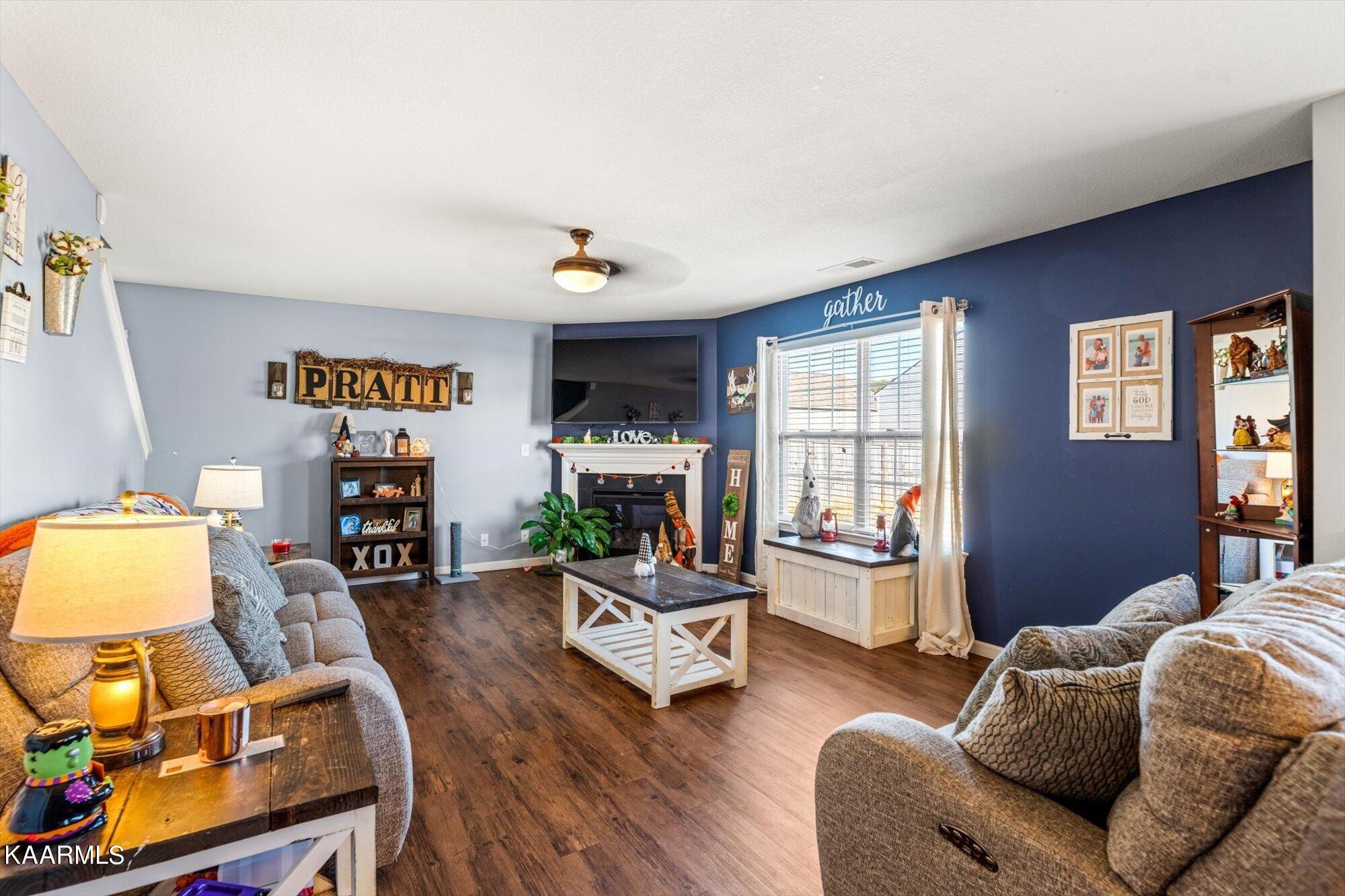7136 Lawgiver Circle Corryton, TN 37721 - Photo 9 of 12 a living room with furniture and wooden floor