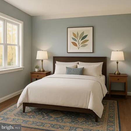 a bedroom with a bed and a lamp on dresser