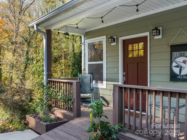 a view of a balcony with chairs