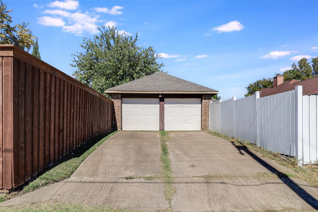 1728 Hackamore Street Mesquite, TX 75149 - Photo 21 of 22 View of 2-car garage from the alley in back of the home