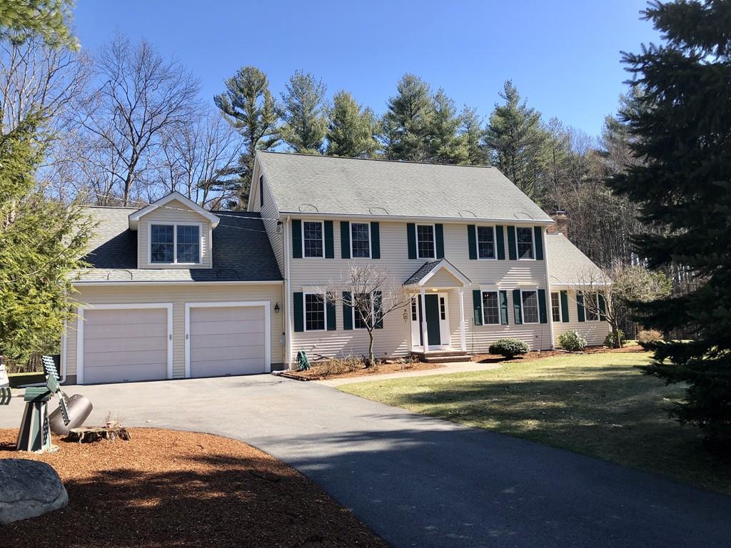 18 Cow Pond Brook Road Groton, MA 01450 - Photo 1 of 40 a front view of a house with a yard