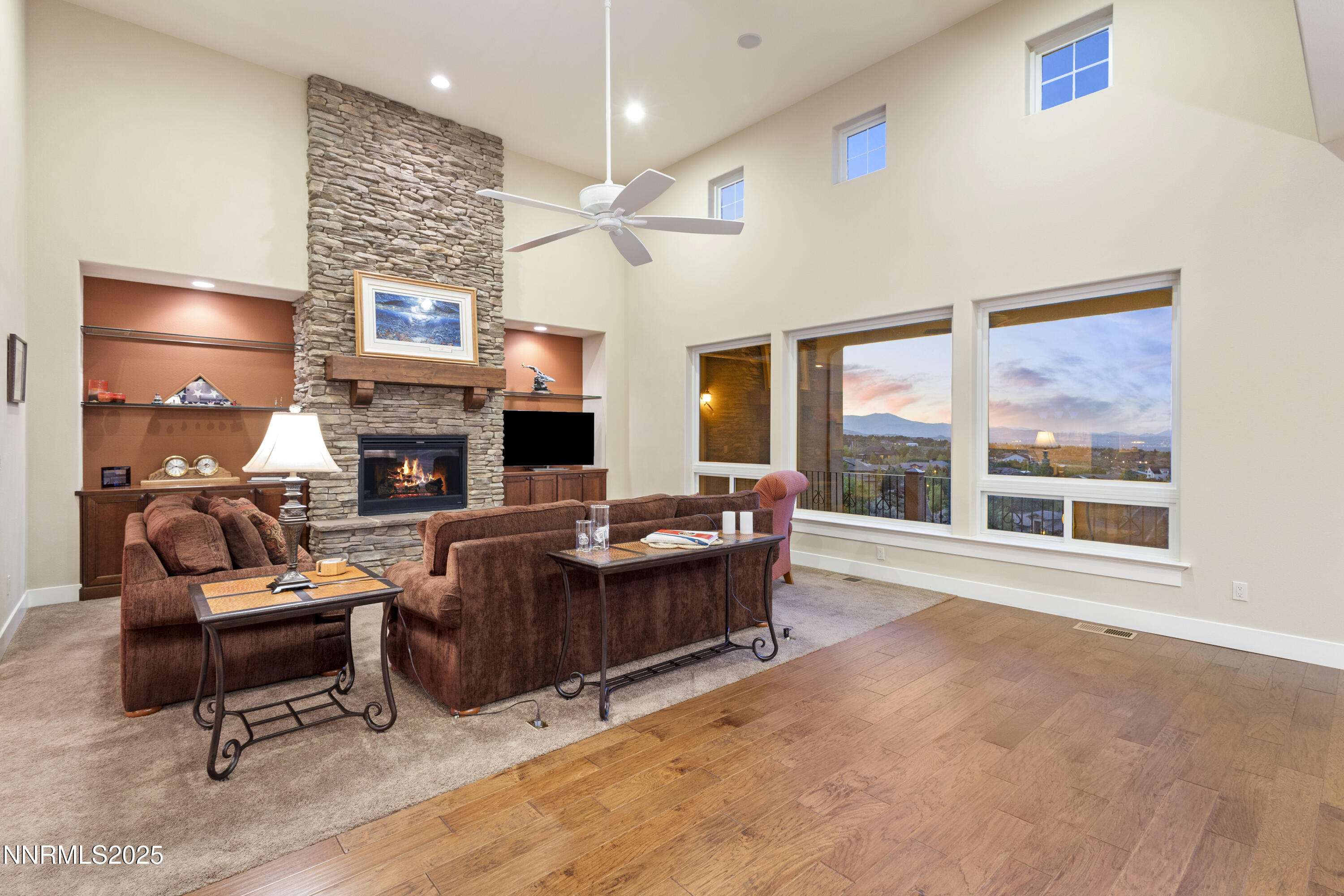 3705 Boulder Patch Reno, NV 89511 - Photo 19 of 41 a living room with furniture large window and a fireplace