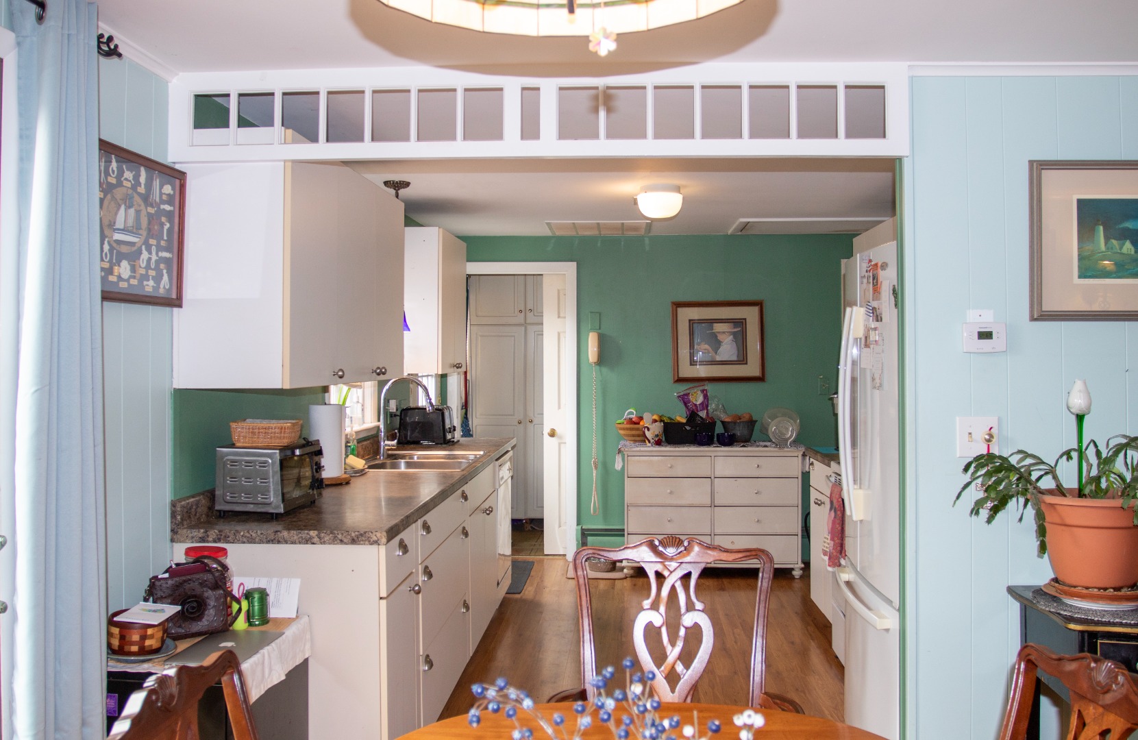 11 Newtown Road Nantucket, MA 02554 - Photo 10 of 20 a kitchen with a refrigerator and a stove