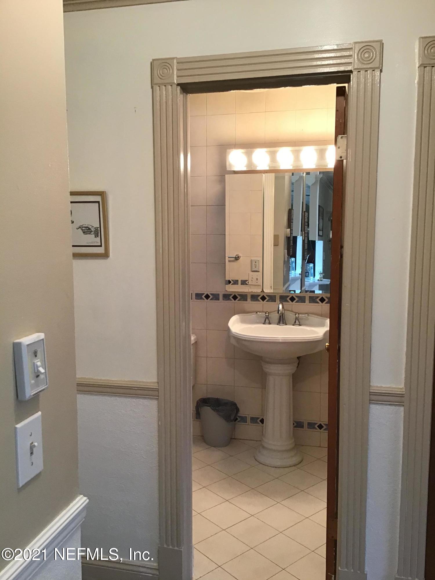 8213 Vermanth Road Jacksonville, FL 32211 - Photo 4 of 9 Pedestal Sink w/ Vanity in Guest Bath