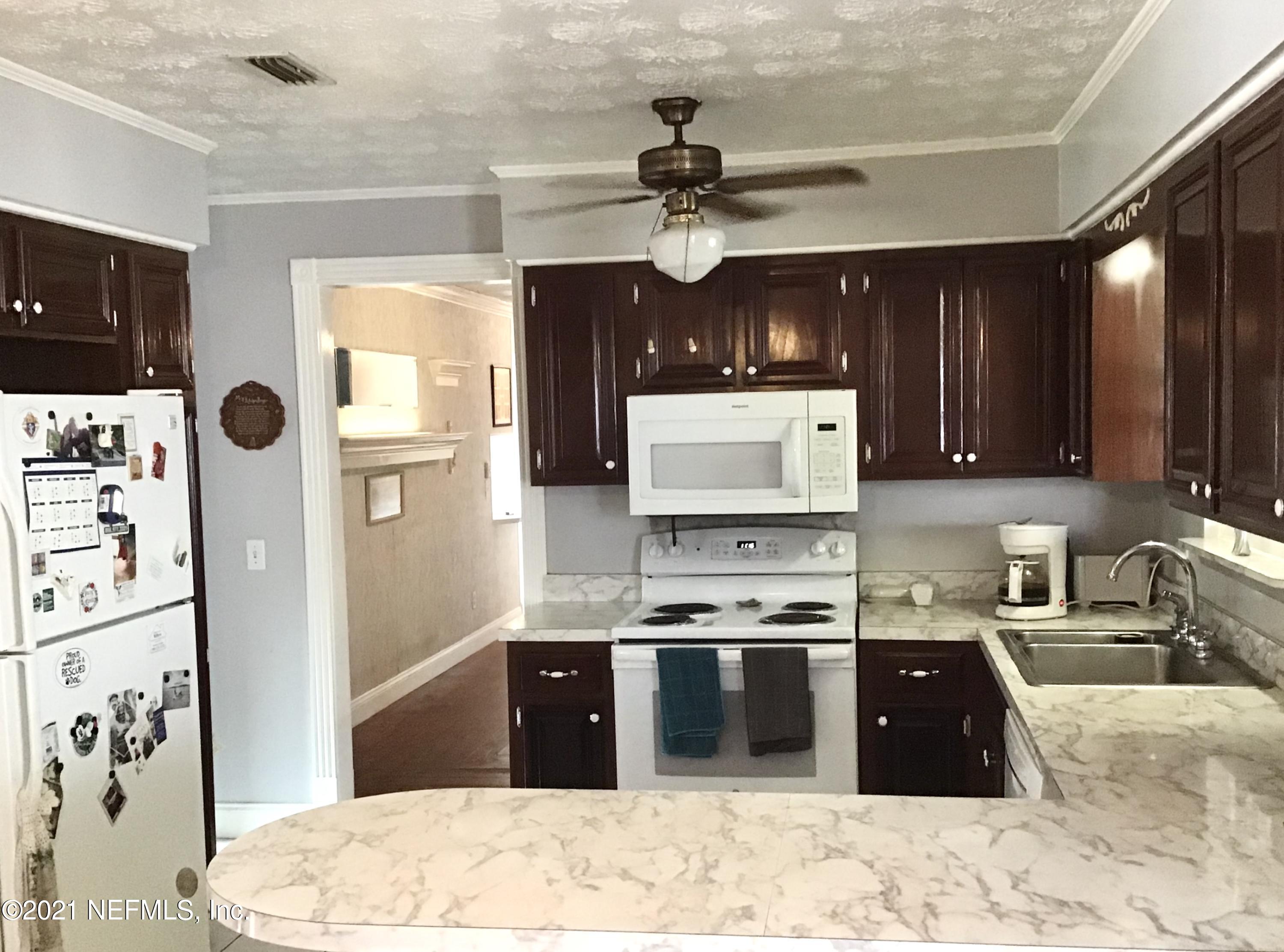 8213 Vermanth Road Jacksonville, FL 32211 - Photo 8 of 9 Plenty of Cabinet Spa