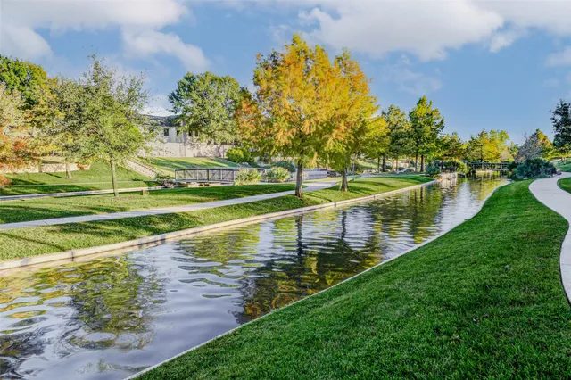 a view of a lake with a big yard