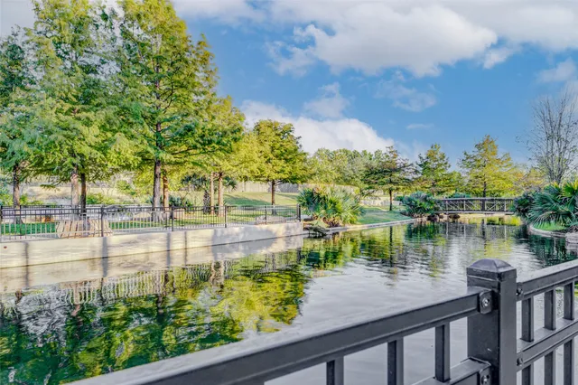 a view of a lake from a balcony