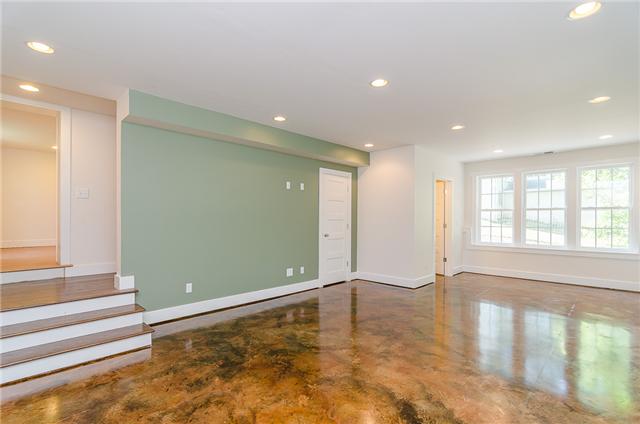 117 North Walnut Street Springfield, TN 37172 - Photo 14 of 20 This rec room is also located in the basement. It features beautiful stained concrete flooring and lots of Energy Star compliant windows which flood the space with natural light.