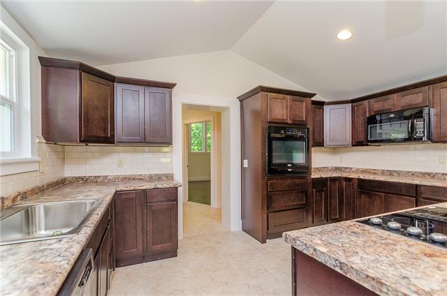 117 North Walnut Street Springfield, TN 37172 - Photo 5 of 20 In this spacious kitchen you'll find Energy Star appliances and water-saving, low-flow faucets.
