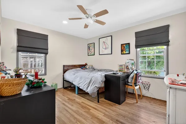 a view of kitchen with wooden floor and window