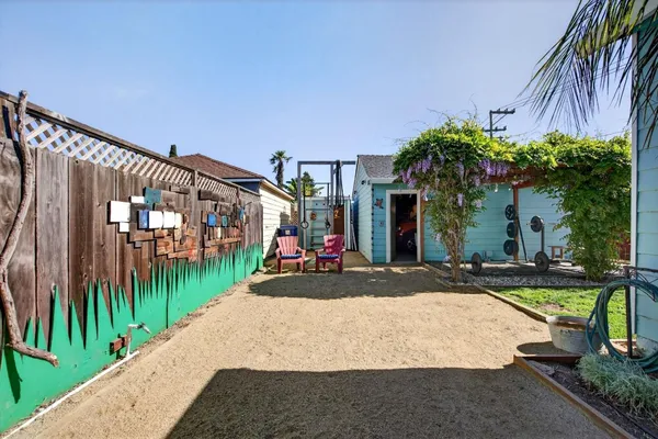 a view of swimming pool with a patio