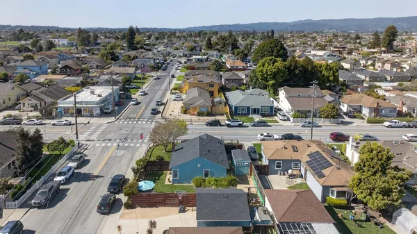 an aerial view of a city with lots of residential buildings