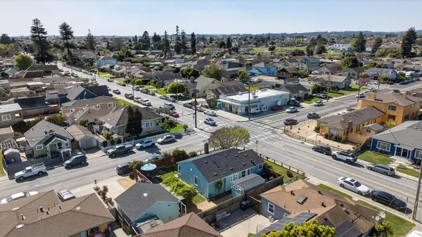 an aerial view of residential house with outdoor space