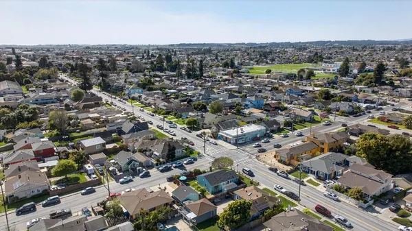 a view of a dining room with furniture window and outdoor kitchen