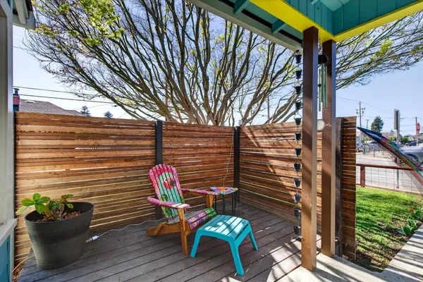 a living room with furniture fireplace and flat screen tv