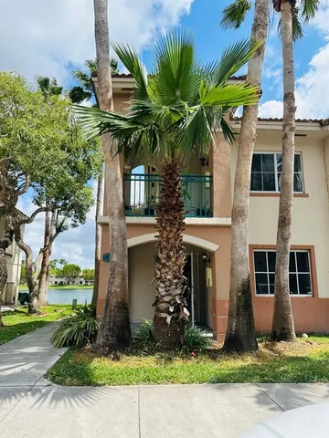 a plant that is in front of a house