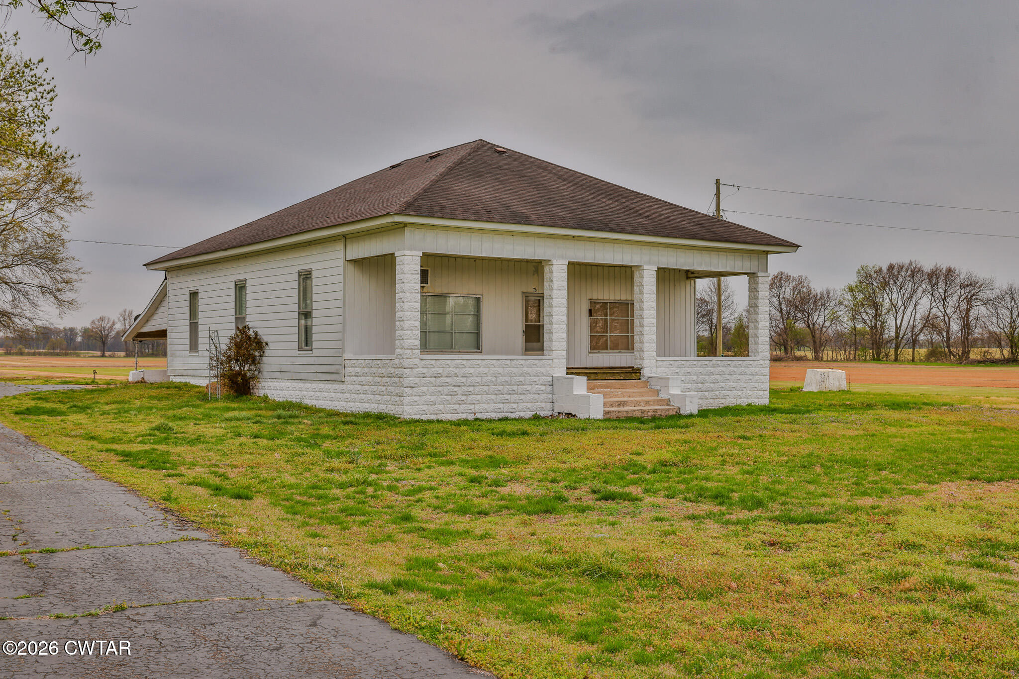 76 New Bethlehem Road Dyer, TN 38330 - Photo 1 of 39 a front view of a house with a yard