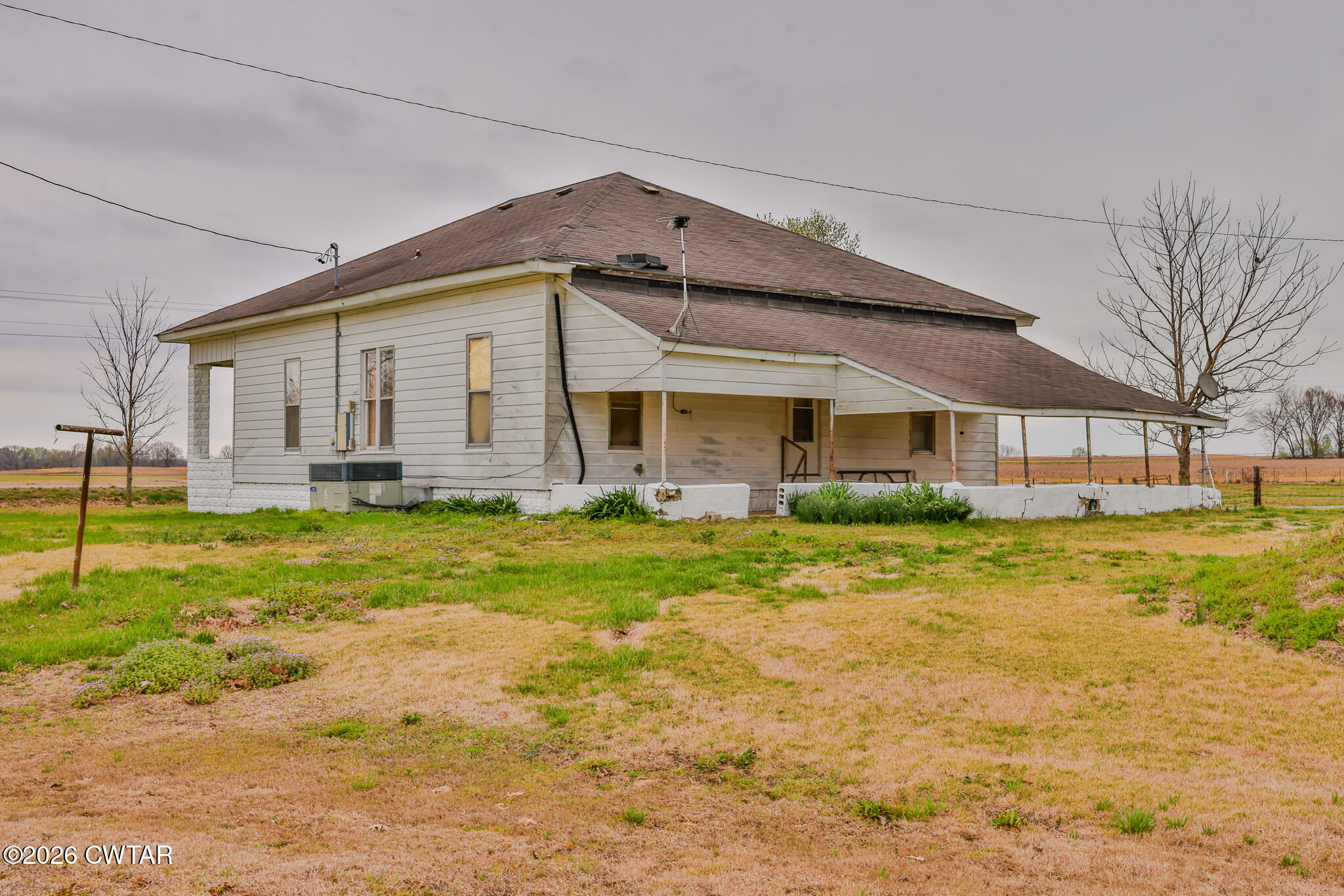 76 New Bethlehem Road Dyer, TN 38330 - Photo 12 of 39 a front view of house with yard and swimming pool