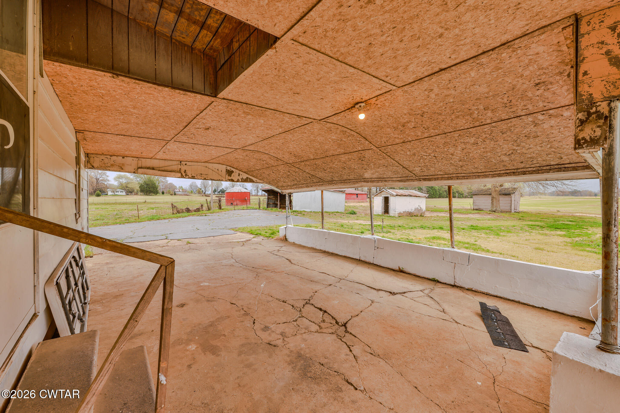 76 New Bethlehem Road Dyer, TN 38330 - Photo 22 of 39 a view of an empty room with a floor to ceiling window