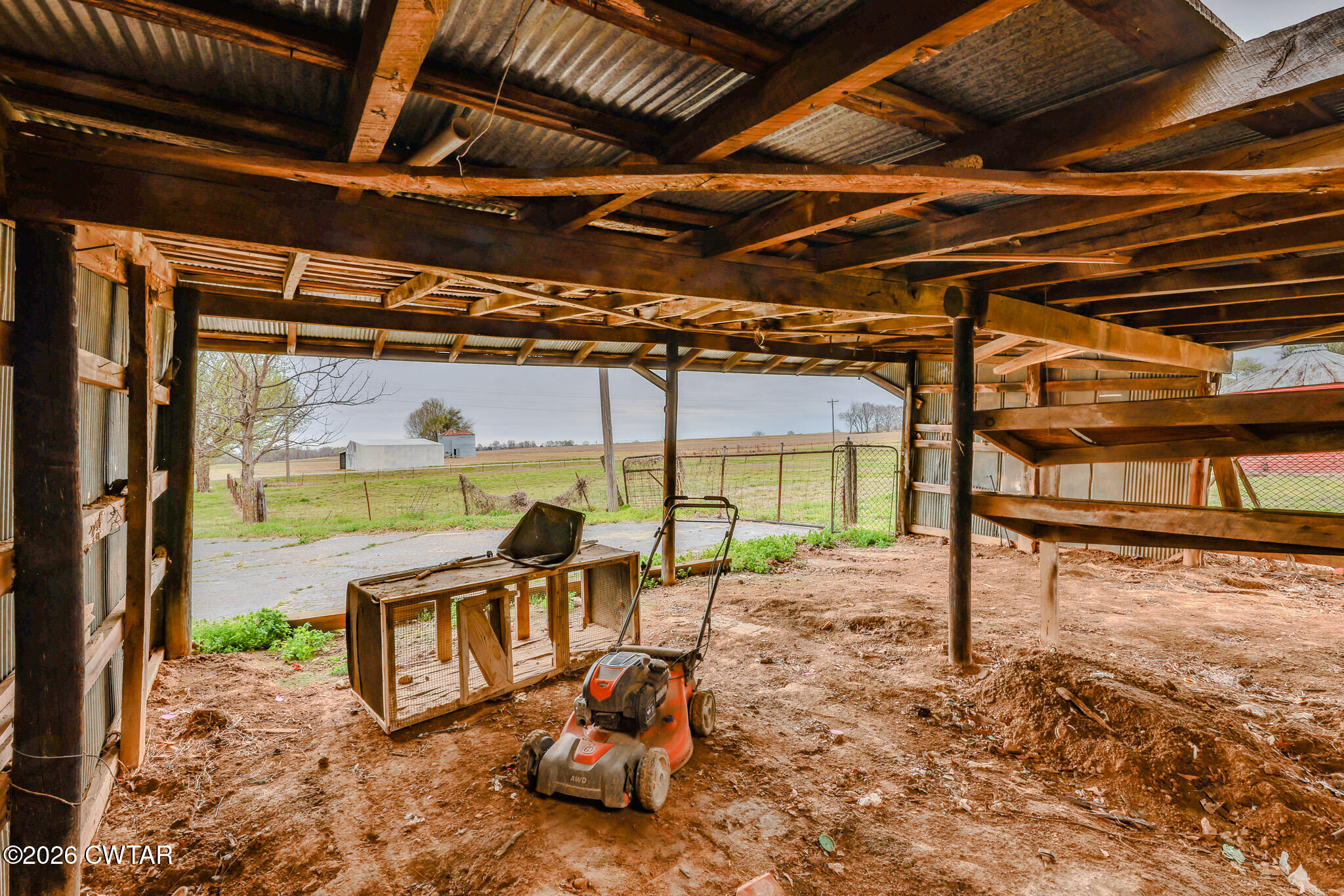 76 New Bethlehem Road Dyer, TN 38330 - Photo 26 of 39 a view of a porch with a table and chairs