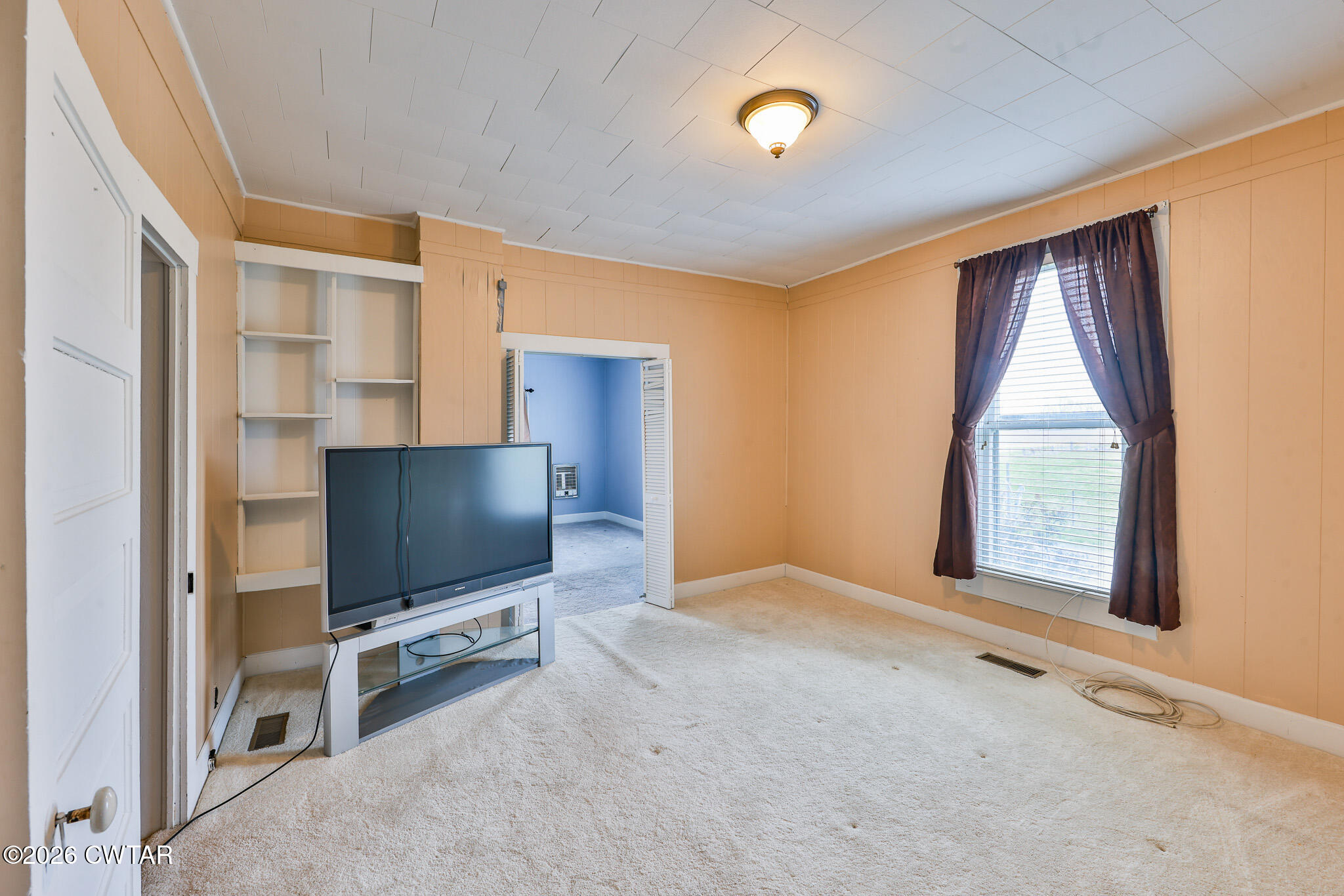 76 New Bethlehem Road Dyer, TN 38330 - Photo 38 of 39 an empty room with windows and flat screen tv