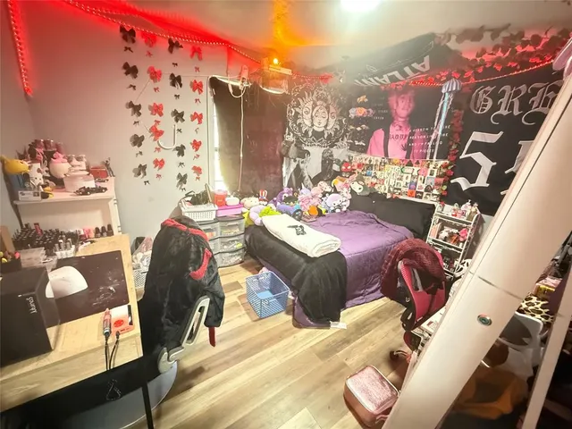 a view of a workspace with furniture and toys